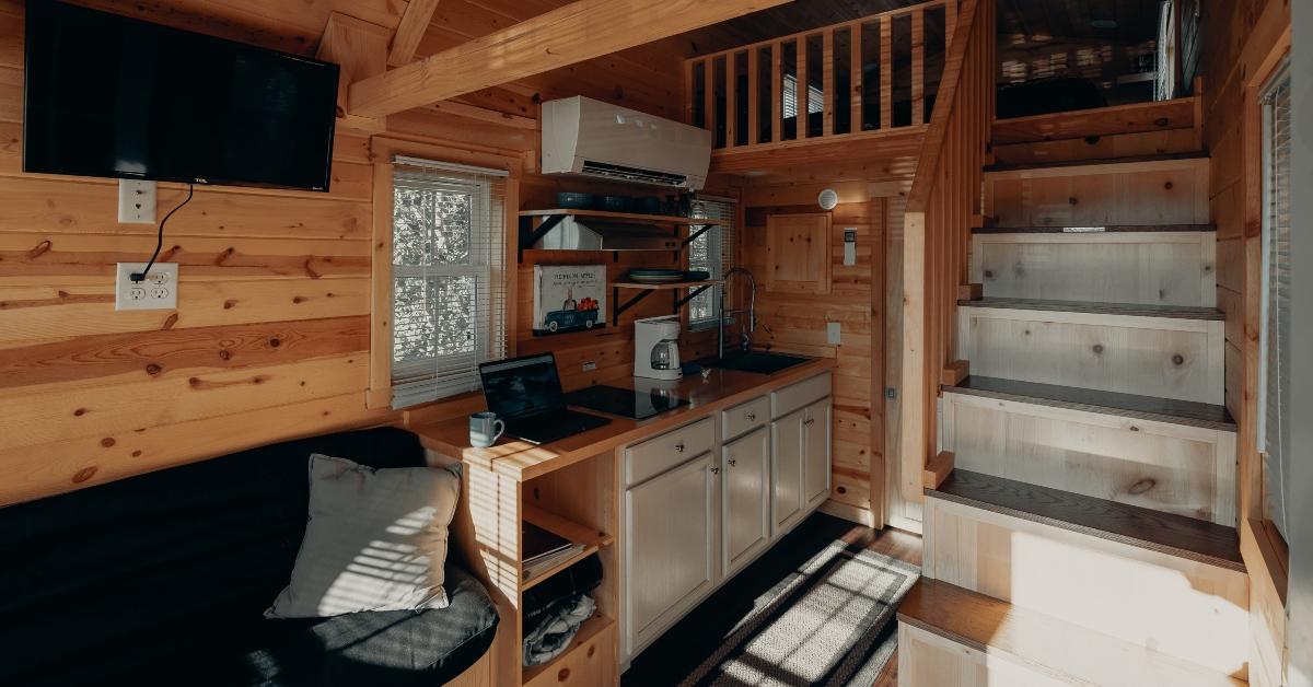 The kitchen and living space in a tiny home.