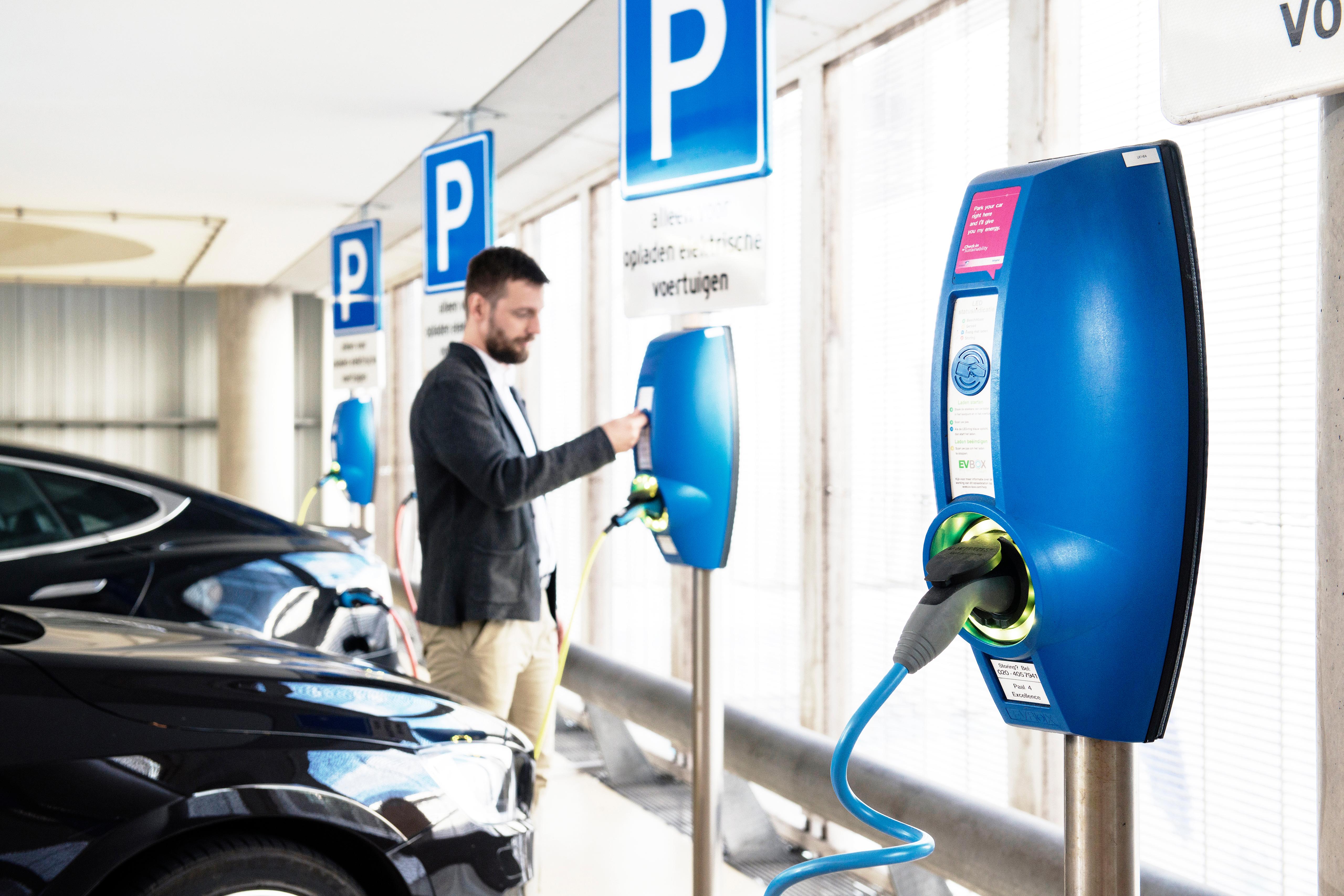 Man Using EVBox Car Charger