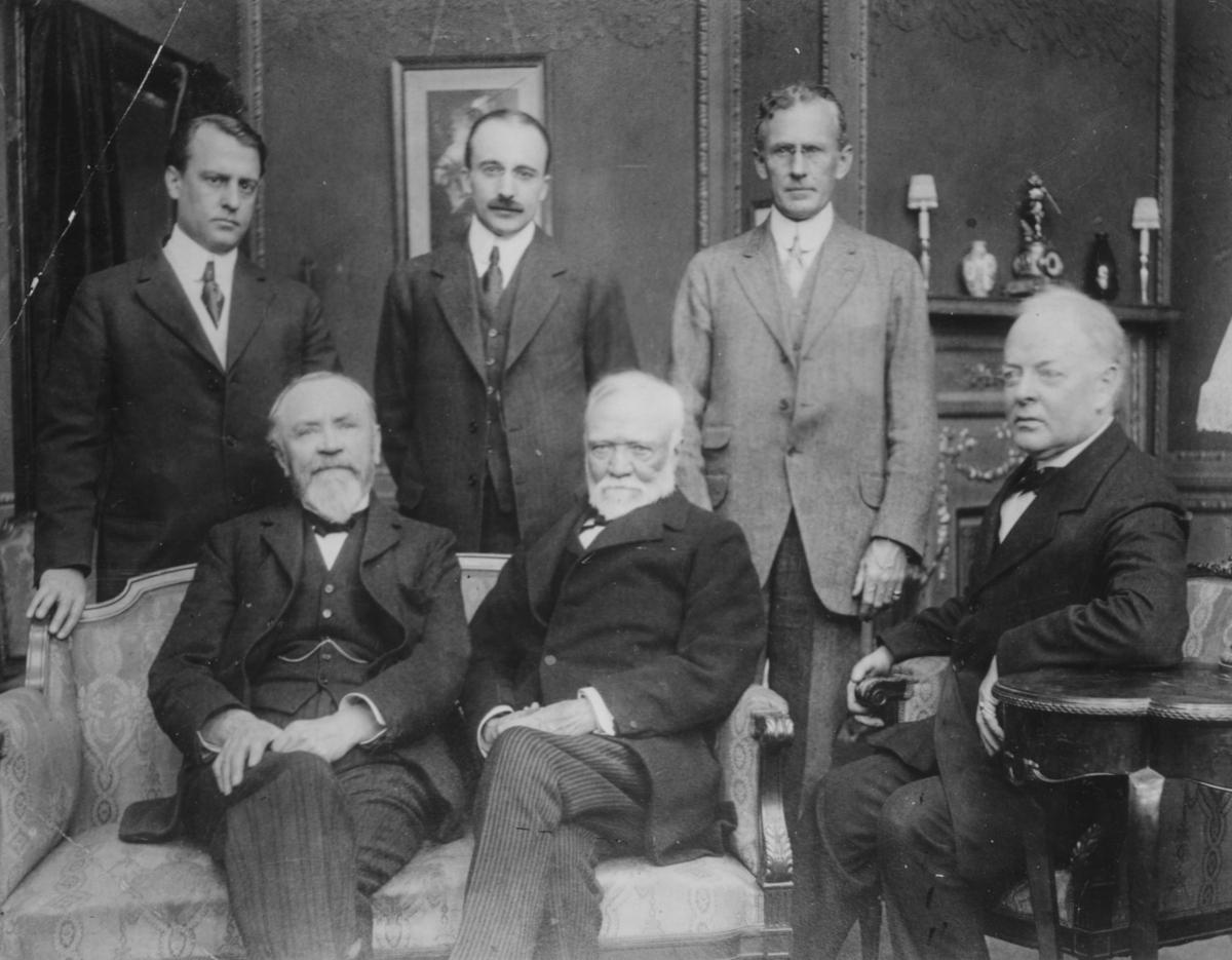 Andrew Carnegie (center)