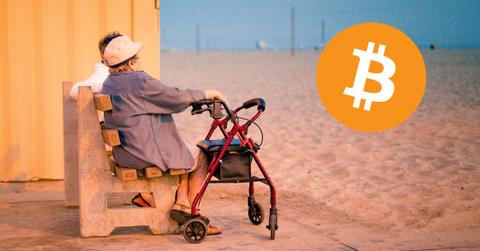 Retired couple sitting on a beach