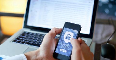 A person with a smartphone in hand