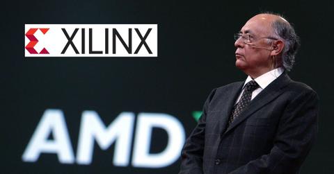 Xilinx logo over image of CEO of AMD on stage