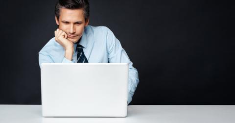 Man looking at a laptop