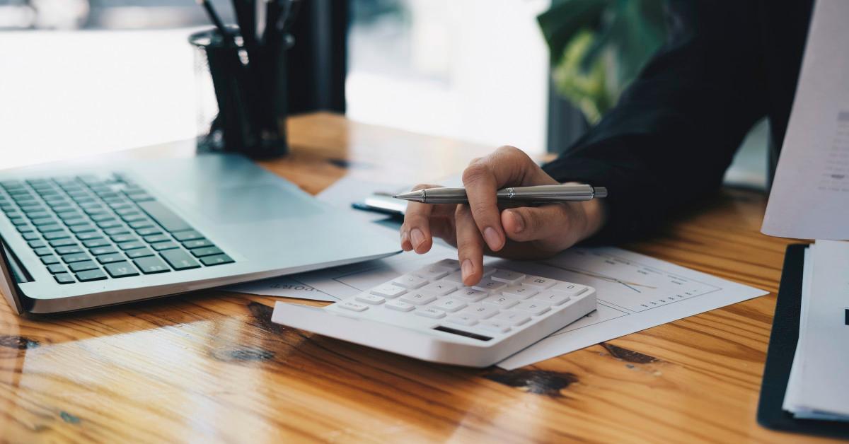 Accountant using calculator