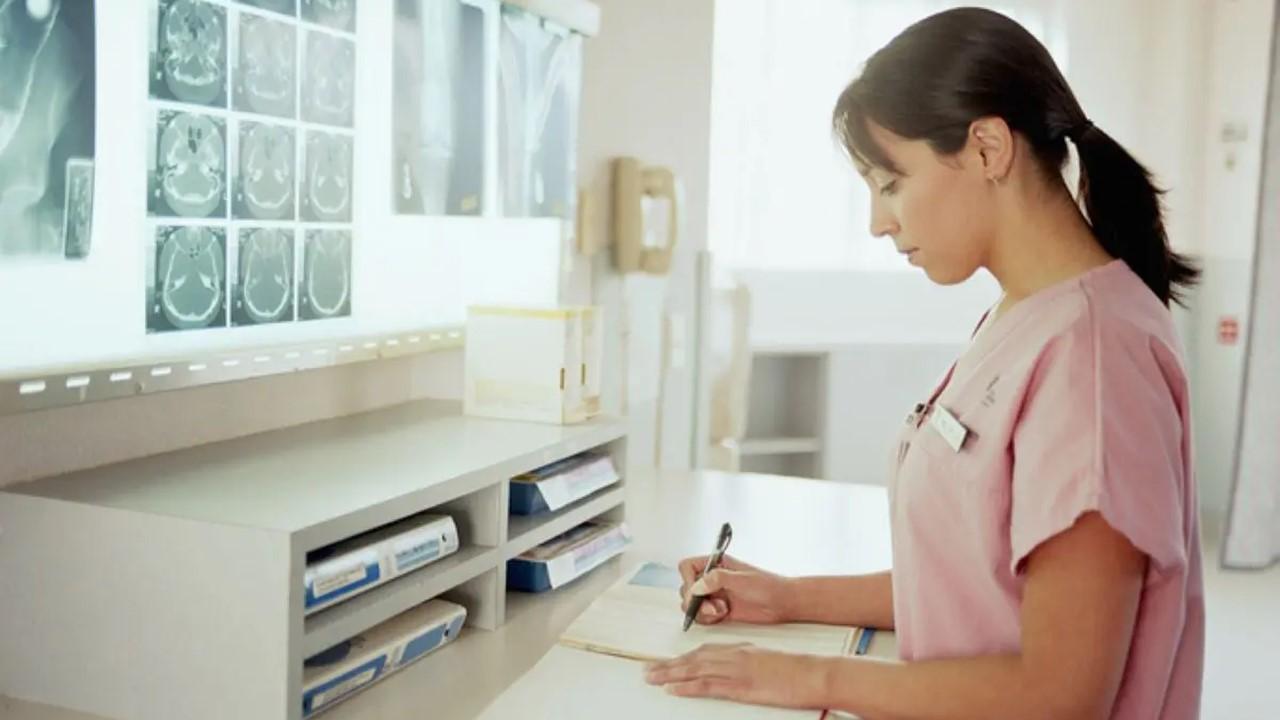 A woman working as a medical transcriptionist