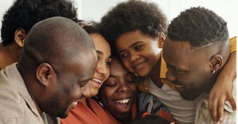 Family gathering for a group hug