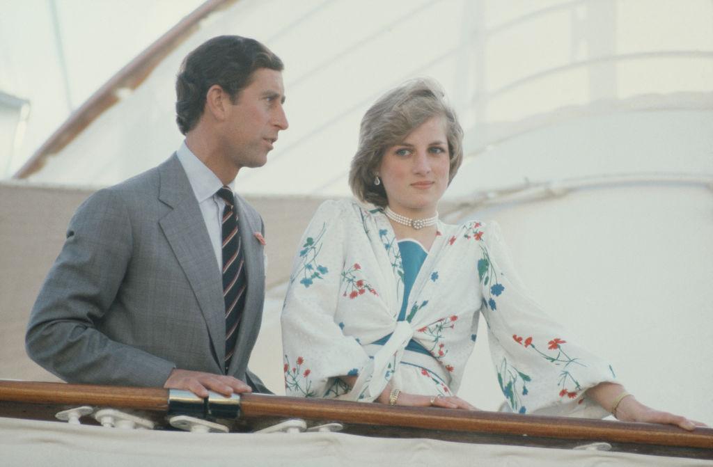 Prince Charles and Diana, Princess of Wales on board the Royal Yacht Britannia in Gibraltar, at the start of their honeymoon cruise, August 1981. She is wearing a floral silk dress by Donald Campbell. 