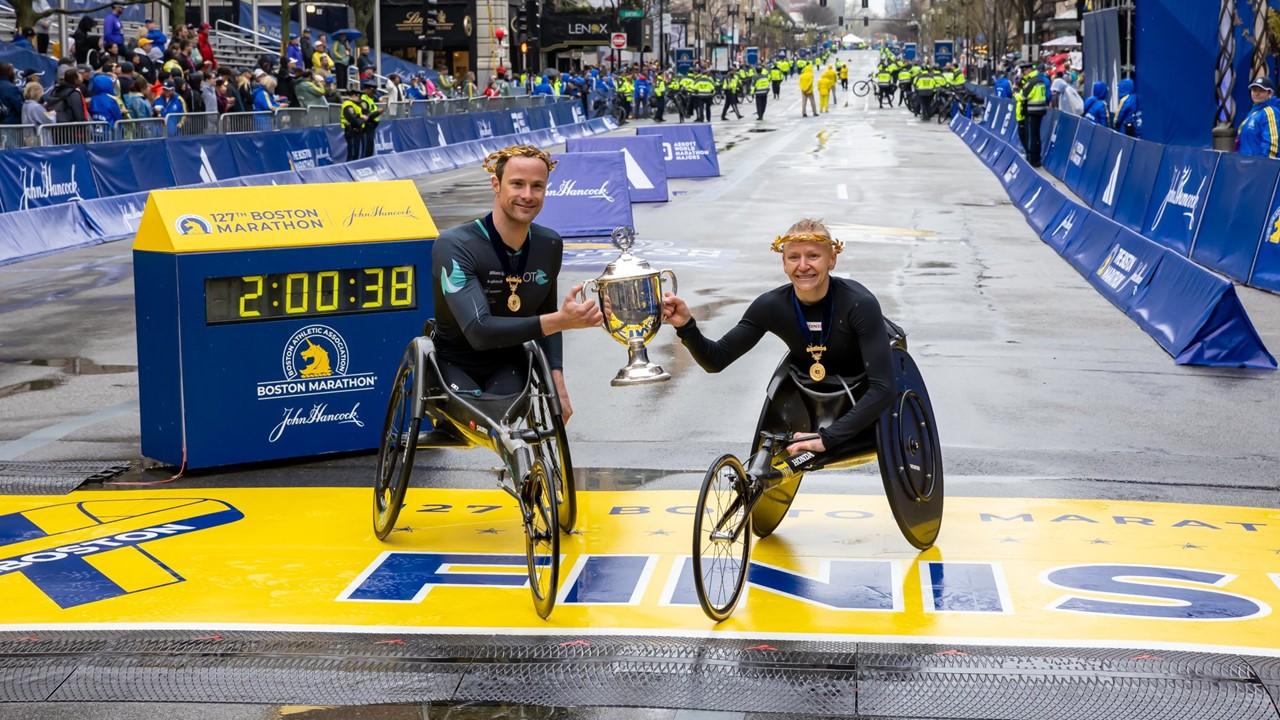 Marcel Hug and Susannah Scaroni won their wheelchair divisions in the 127th Boston Marathon on April 17, 2023