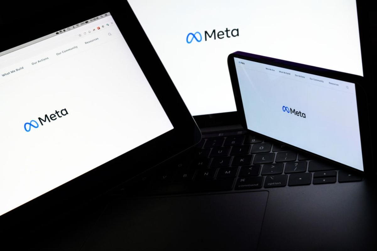 Meta logo on computer screens