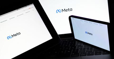 Meta logo on computer screens