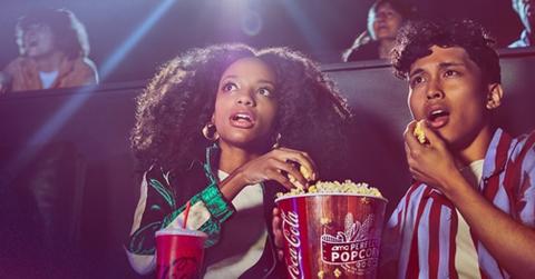 People eating popcorn