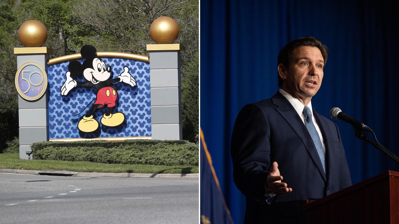 Walt Disney sign and Governor Ron DeSantis