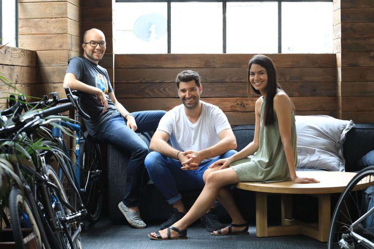 Canva co-founders Cameron Adams (L), Cliff Obrecht, and Melanie Perkins (R)