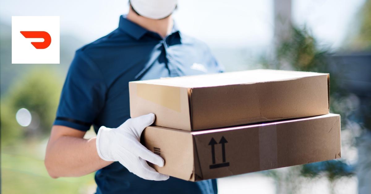 A courier picking up packages from a home beside a DoorDash logo.