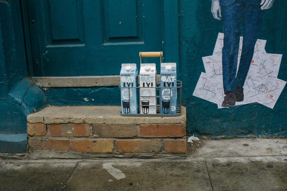 Oatly milk on a doorstep