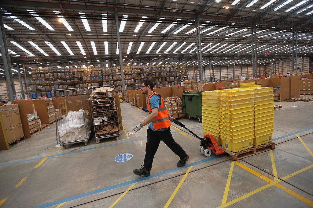 An Amazon worker in a warehouse