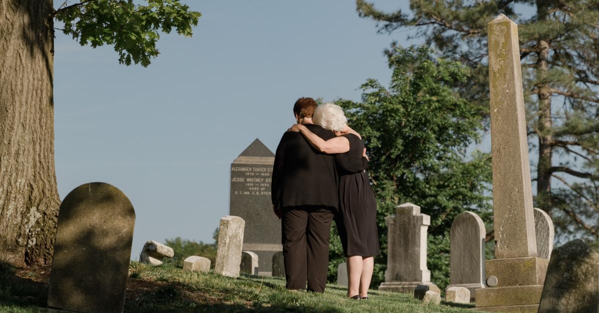 People visiting a cemetery