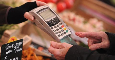 A person using a credit card