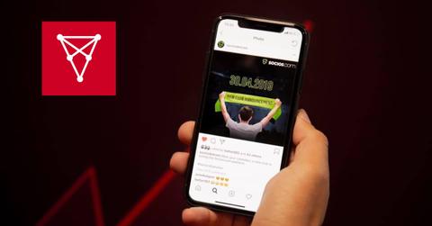 Chiliz app on a phone and company logo