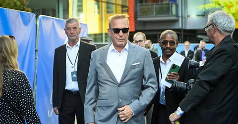 Kevin Costner in a gray suit at the U.K. premiere of Yellowstone for Paramount+