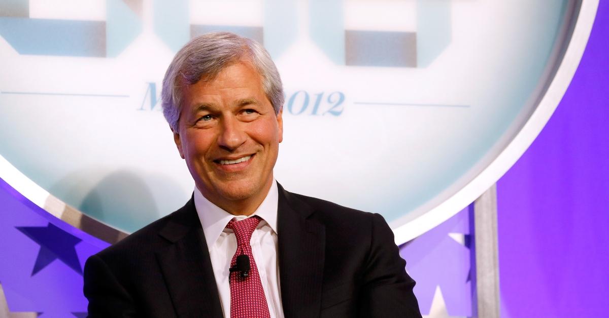 Jamie Dimon smiling in suit and tie.