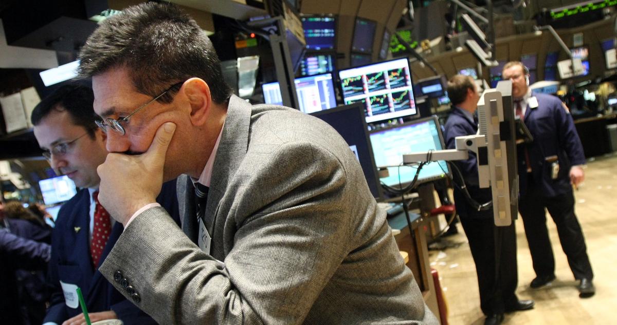 Traders worry on a stock market floor