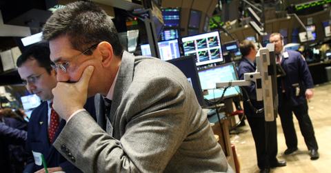 Traders worry on a stock market floor