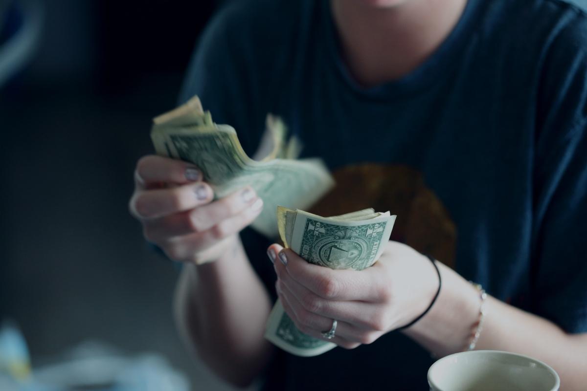 A woman counting money