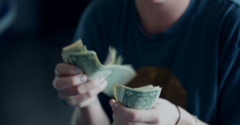 A woman counting money