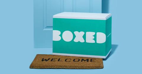 A Boxed package at a doorstep