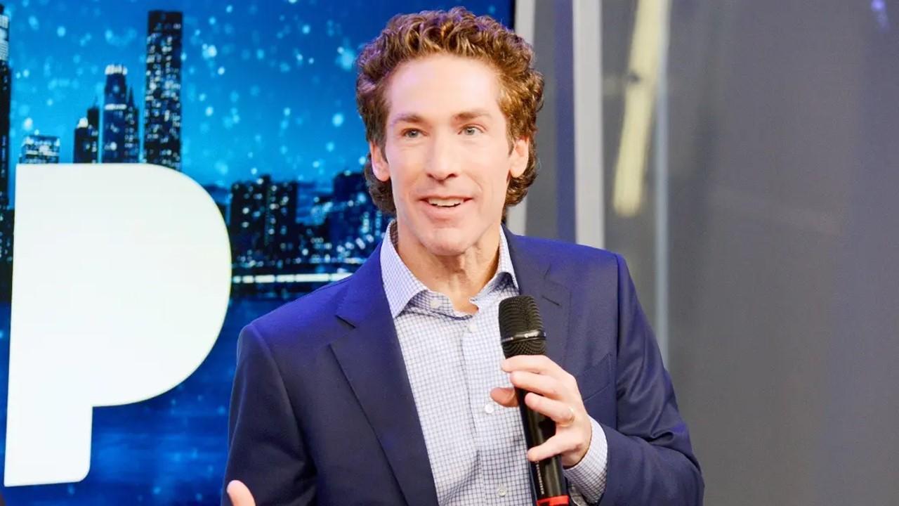 Joel Osteen wearing a blue suit.