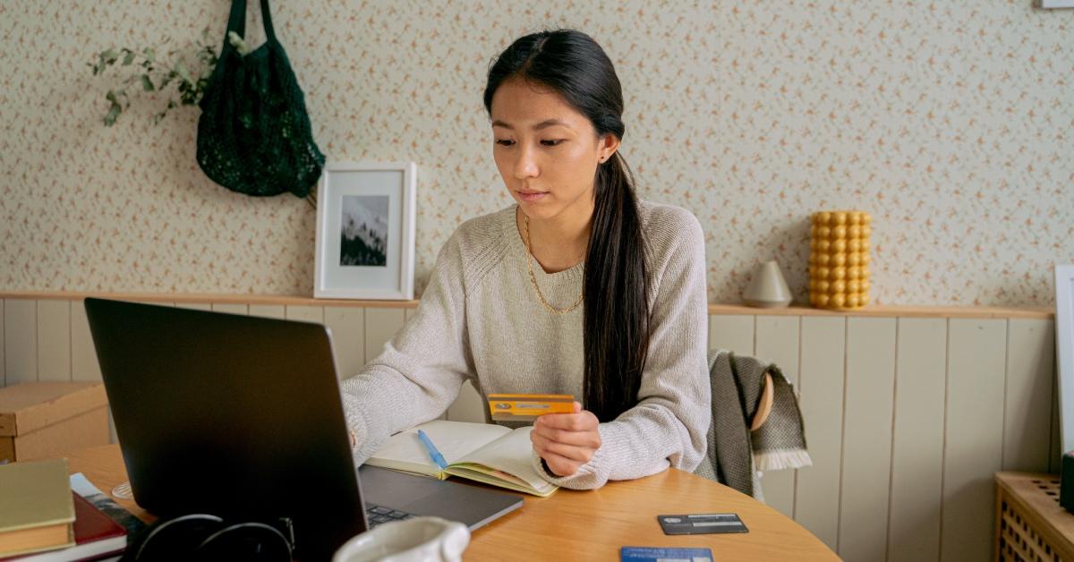 woman checking her credit card interest rates