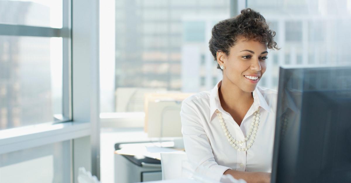 A woman working at her desk.