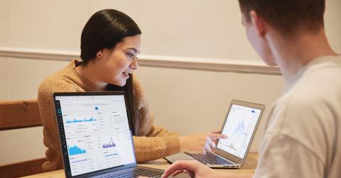 Colleagues looking at a graph