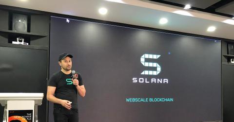 A presenter at a Solana event