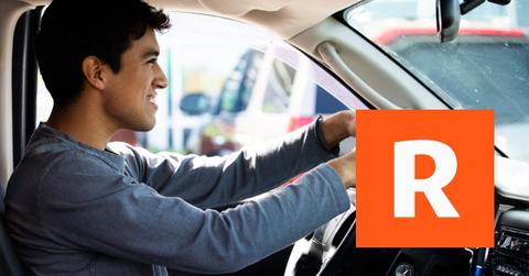 A person driving a car