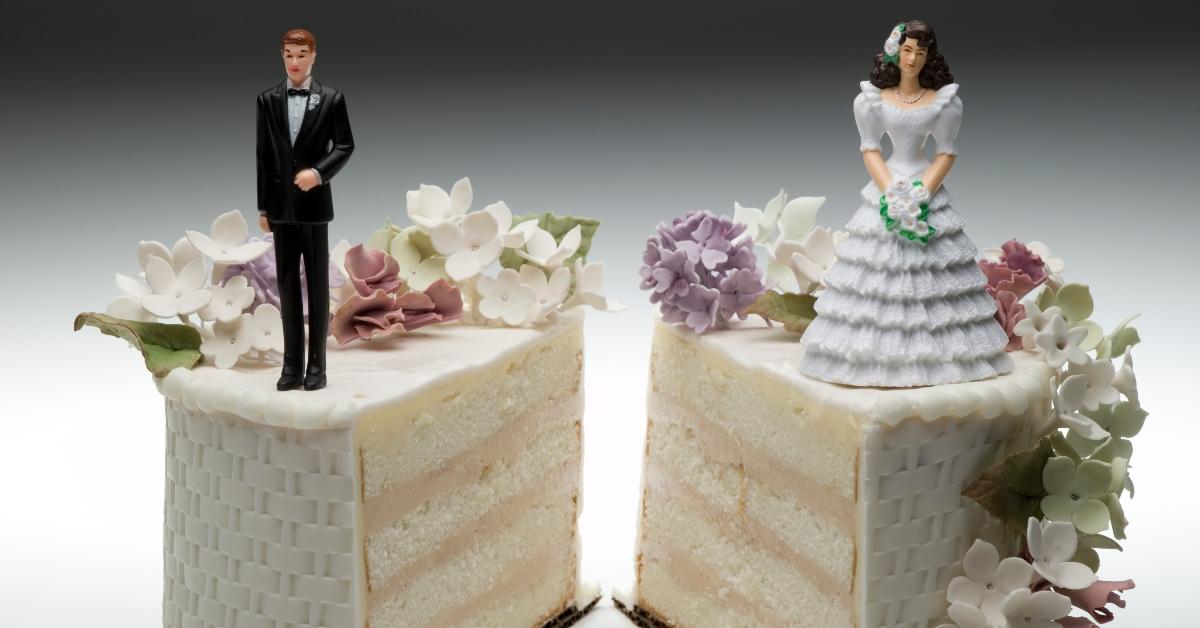 A spilt wedding cake indicating a divorce