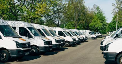 Business vans parked in a parking lot