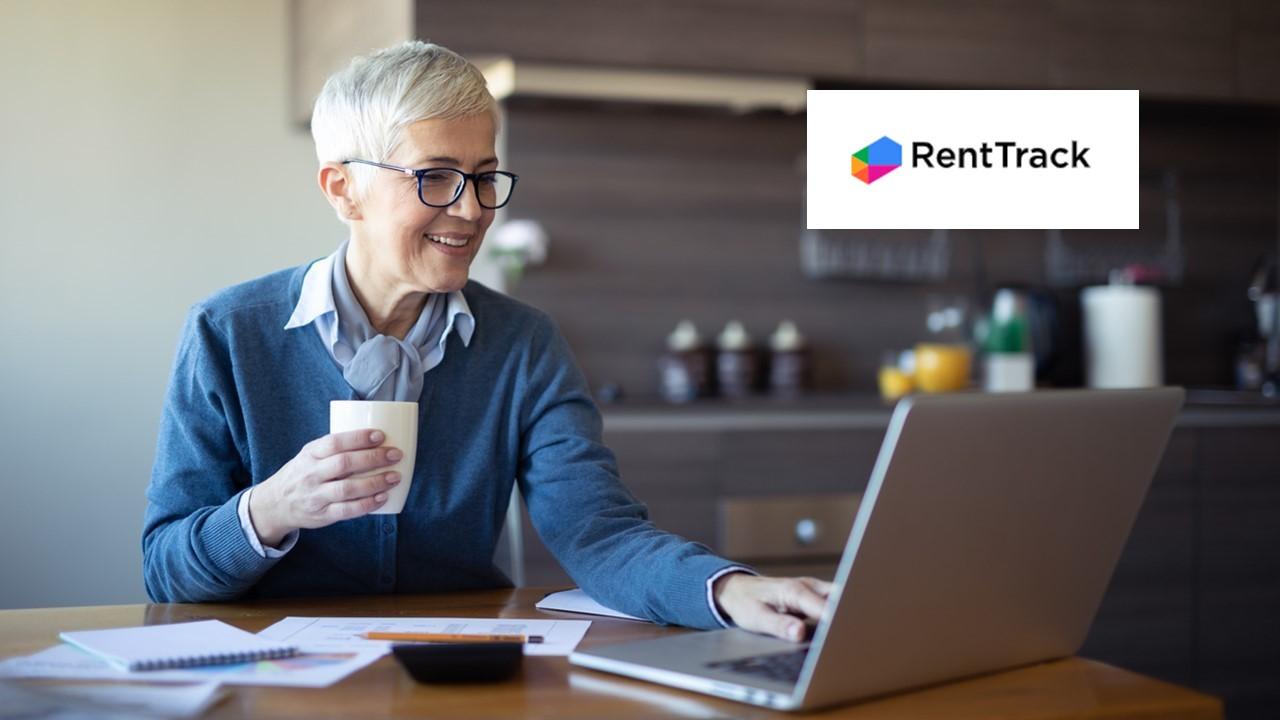 A woman looking at her credit report and the RentTrack logo