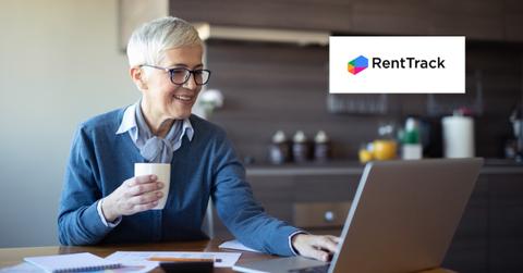 A woman looking at her credit report and the RentTrack logo