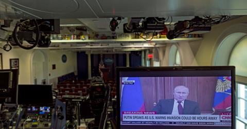 Russia President Putin on screen in White House media room