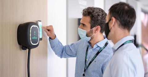 Men using a Wallbox charger