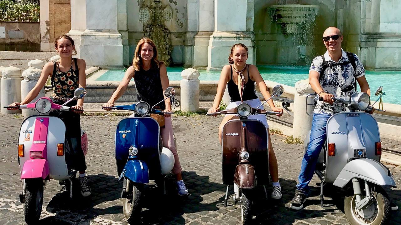 David Risher and family on Vespas in Italy.