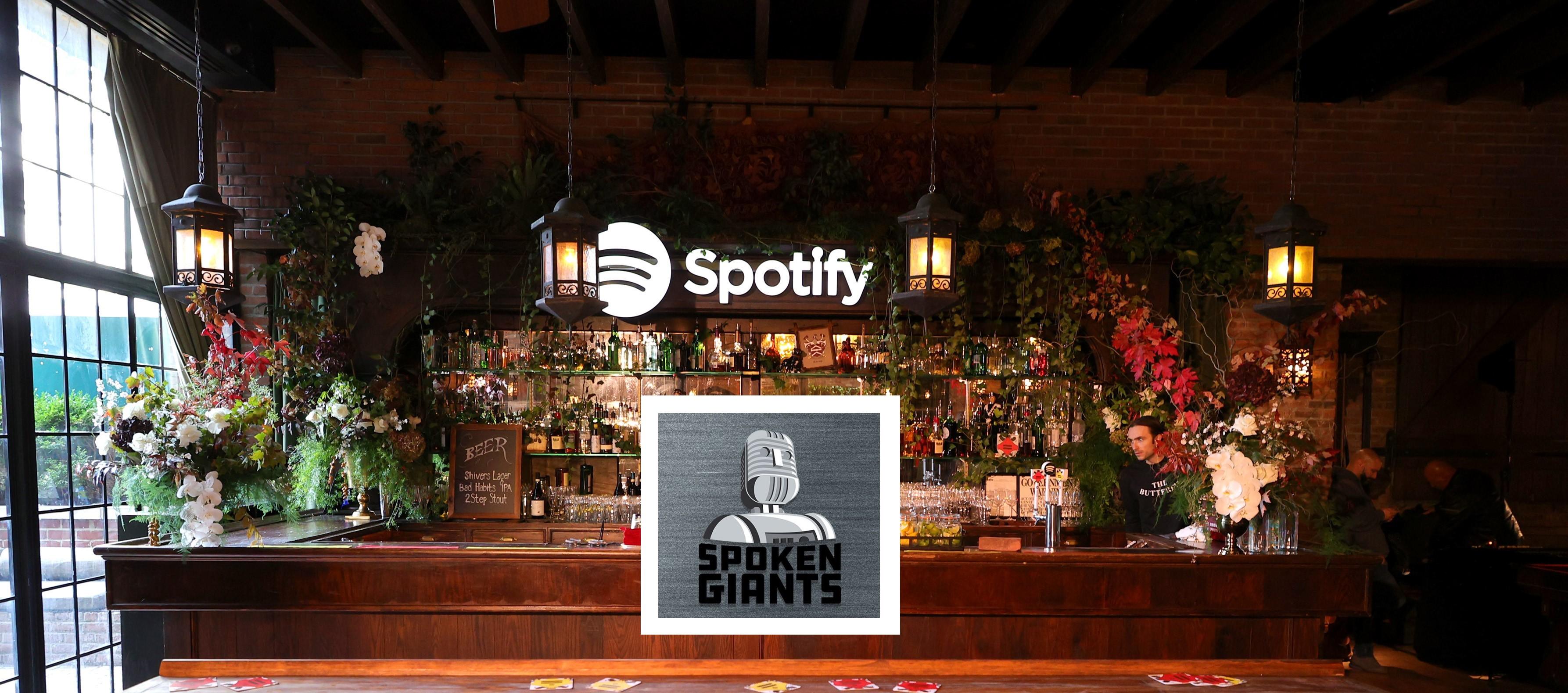 Spoken giants logo over spotify-themed bar