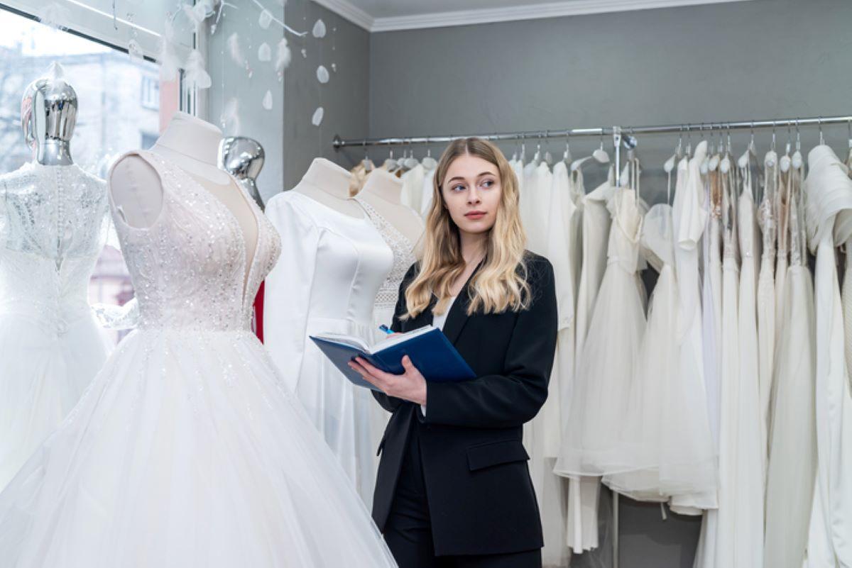 woman checking out wedding dresses