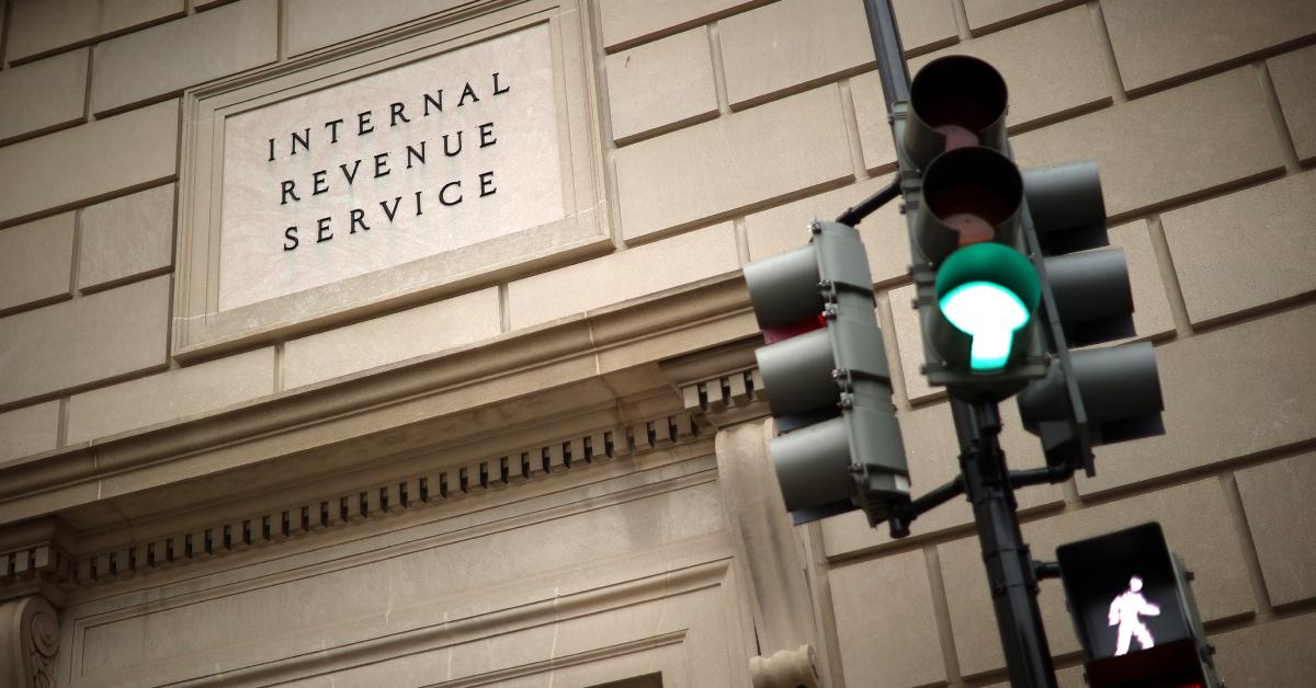  The IRS headquarters building and a green traffic light.