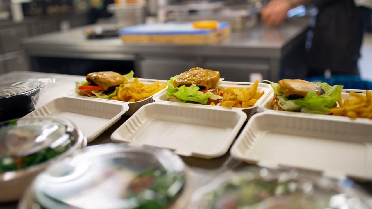 Carryout orders being prepared in a kitchen