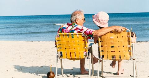 retired couple on the beach