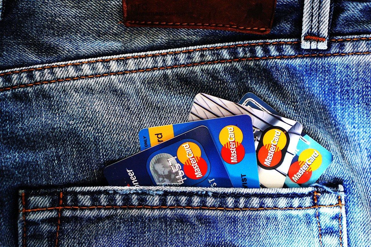 Credit cards in a person's pocket