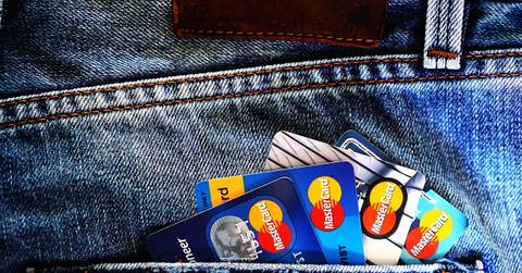 Credit cards in a person's pocket